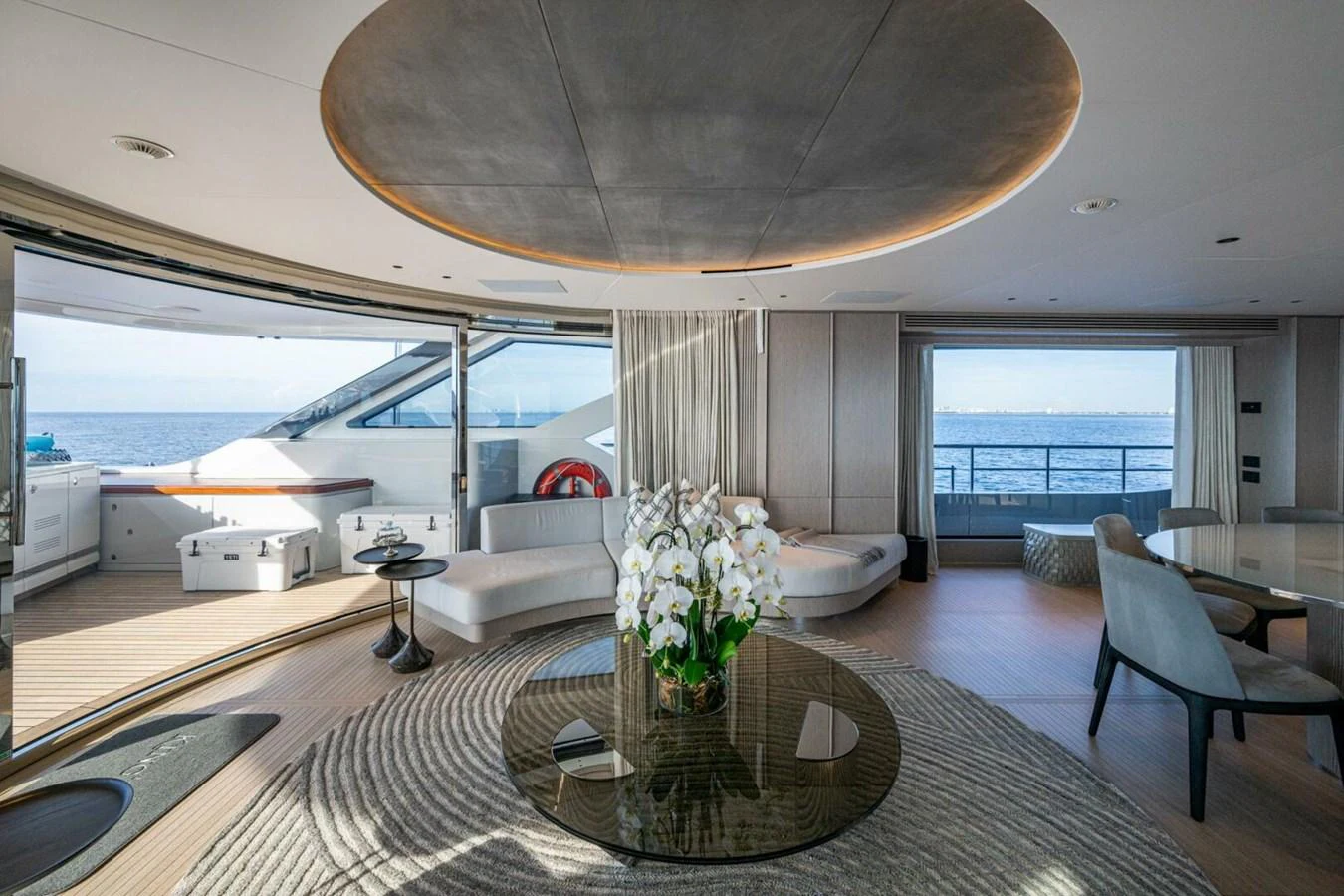 The salon offers a spacious and elegant area with panoramic views and luxurious furnishings. aboard KING'S LAIR Yacht for Sale