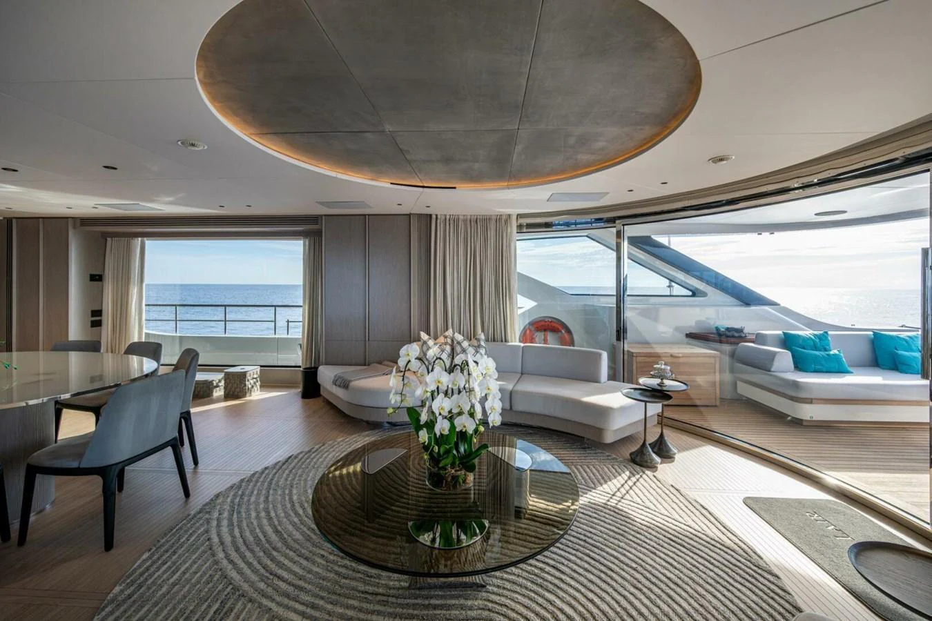 The salon offers a luxurious and spacious area with panoramic views and elegant furnishings. aboard KING'S LAIR Yacht for Sale