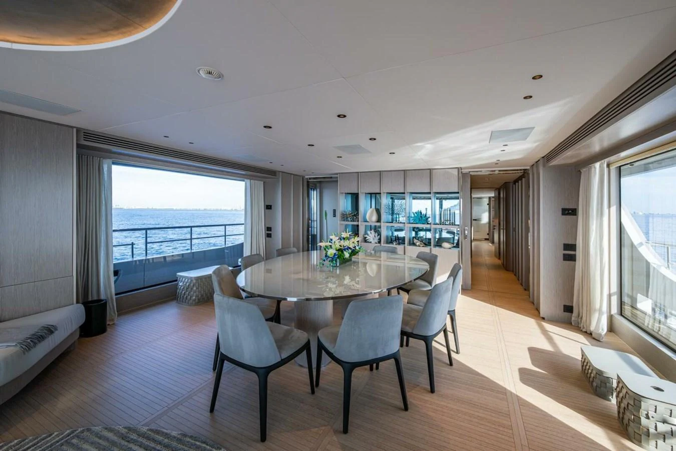 A spacious and elegant dining area with panoramic ocean views. aboard KING'S LAIR Yacht for Sale