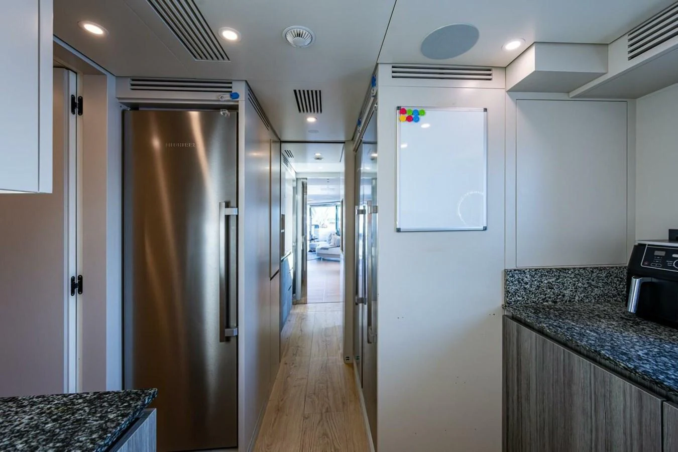 The modern galley features sleek appliances and ample counter space. aboard KING'S LAIR Yacht for Sale