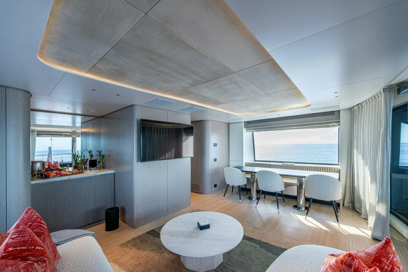 The salon offers a spacious and modern living area with panoramic views of the sea. aboard KING'S LAIR Yacht for Sale