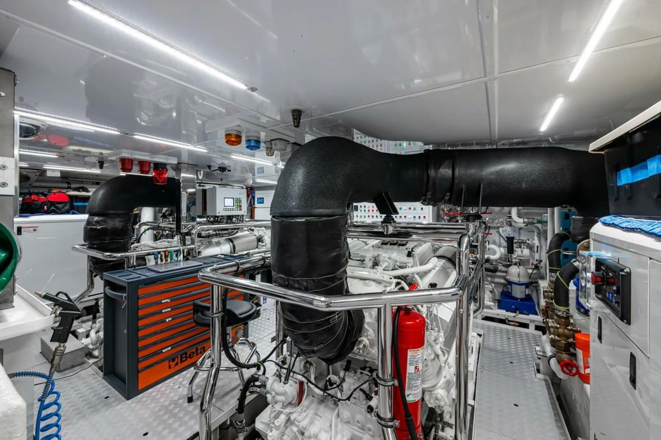The engine room is meticulously organized with advanced machinery and equipment. aboard KING'S LAIR Yacht for Sale