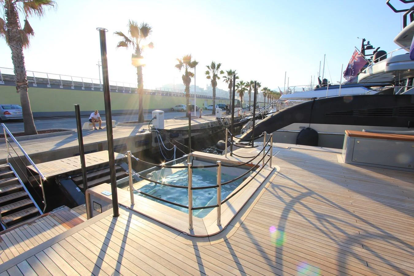 The yacht features a luxurious sundeck with a hot tub, perfect for relaxation. aboard OASIS 34M BO212 Yacht for Sale