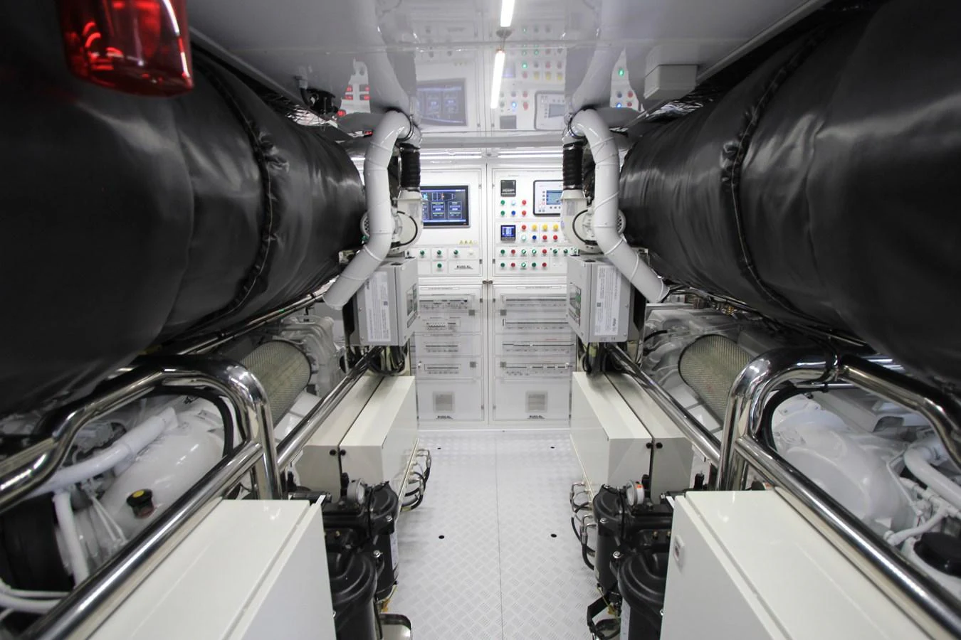 The image showcases the well-organized and high-tech engine room of the yacht. aboard OASIS 34M BO212 Yacht for Sale