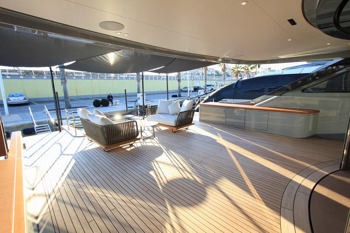 The aft deck features elegant seating and ample space for relaxation. aboard OASIS 34M BO212 Yacht for Sale