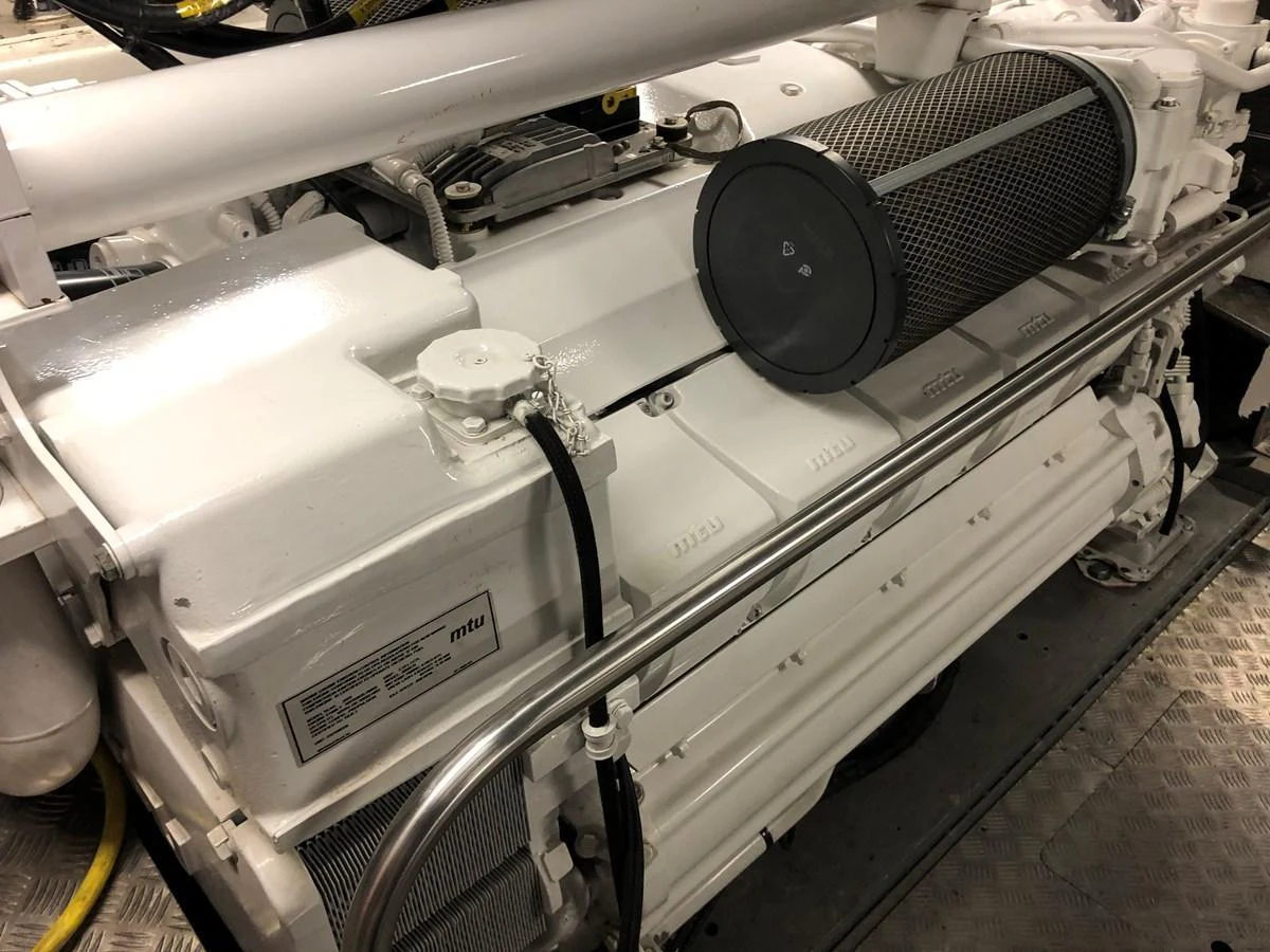 A close-up view of the yacht's engine room showcasing the mechanical components. aboard UNITED SPIRIT Yacht for Sale