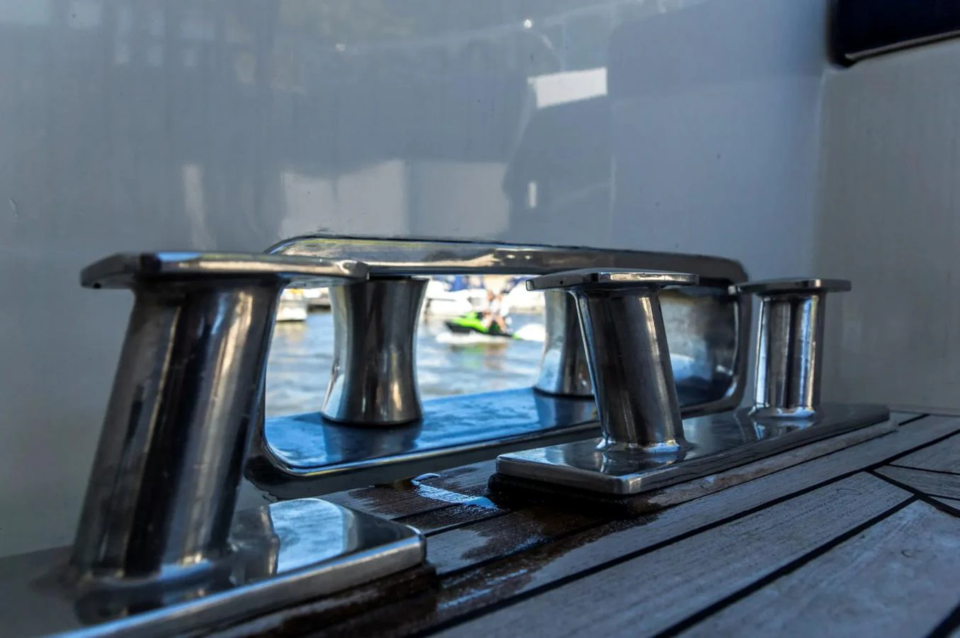 A close-up view of polished stainless steel cleats on the yacht's deck. aboard UNITED SPIRIT Yacht for Sale