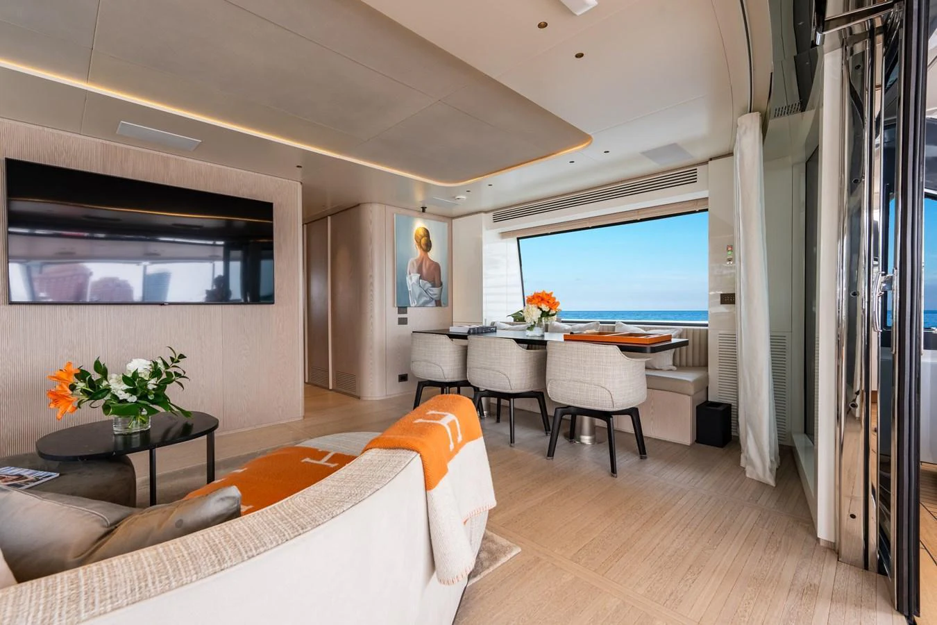 The salon offers a luxurious and comfortable space with a stunning sea view. aboard A+ Yacht for Sale