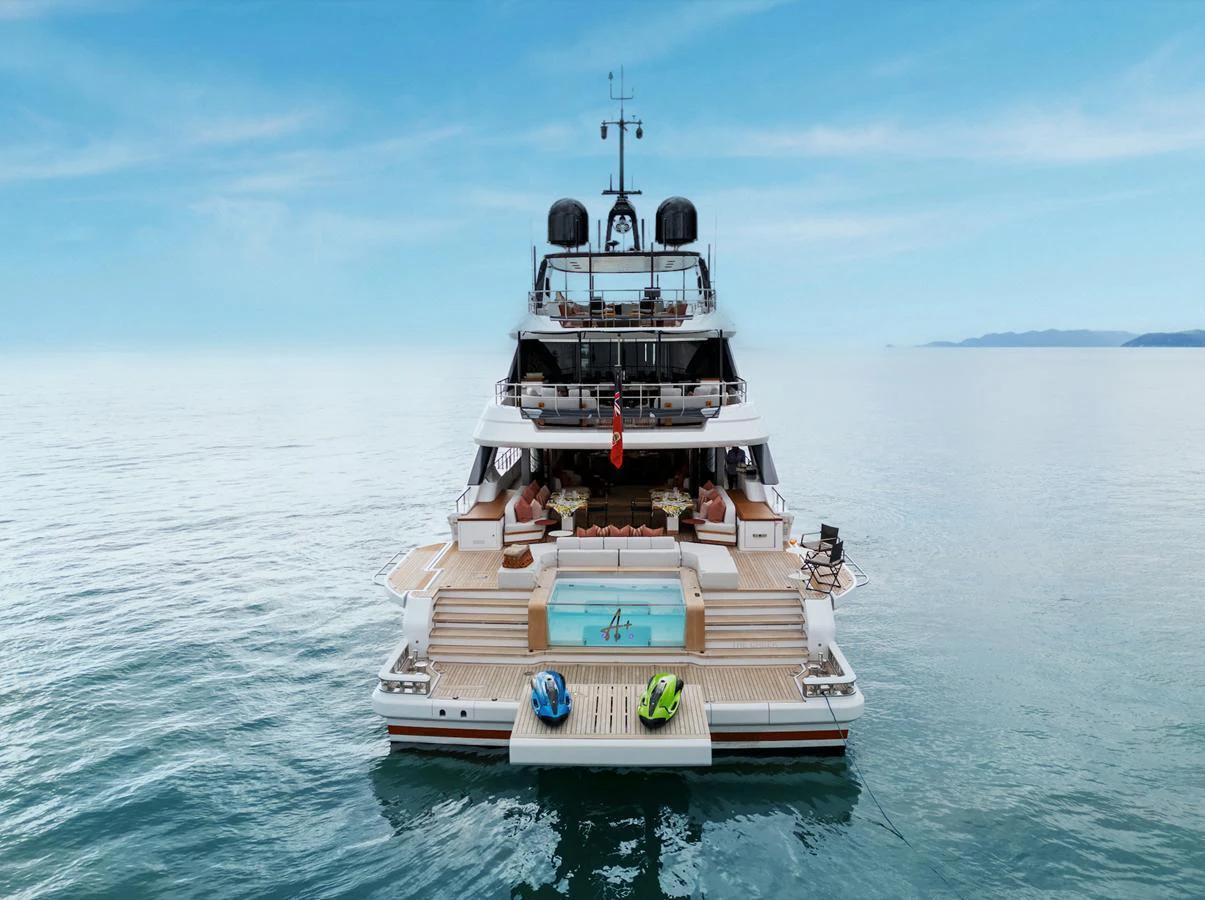 The yacht's aft deck features a luxurious pool and ample lounging areas, perfect for relaxation and entertainment. aboard A+ Yacht for Sale