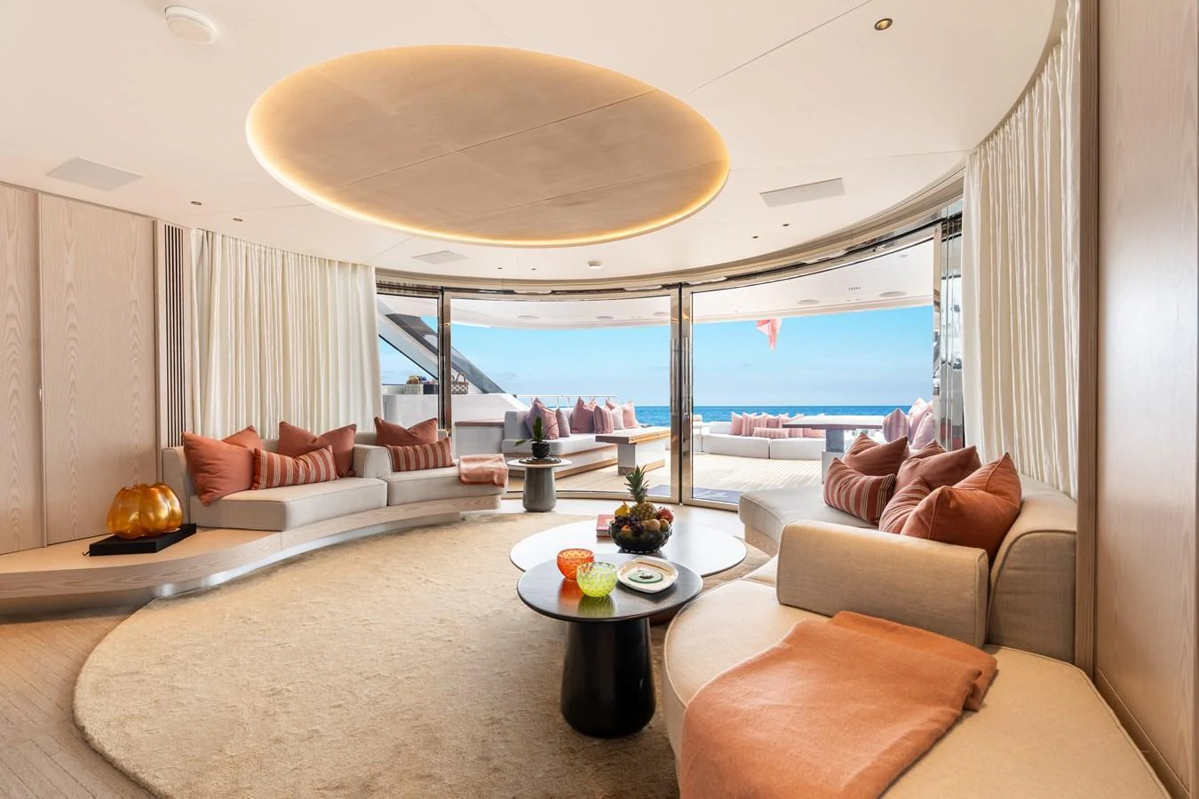 The salon offers a luxurious and spacious area with panoramic views and elegant furnishings. aboard A+ Yacht for Sale