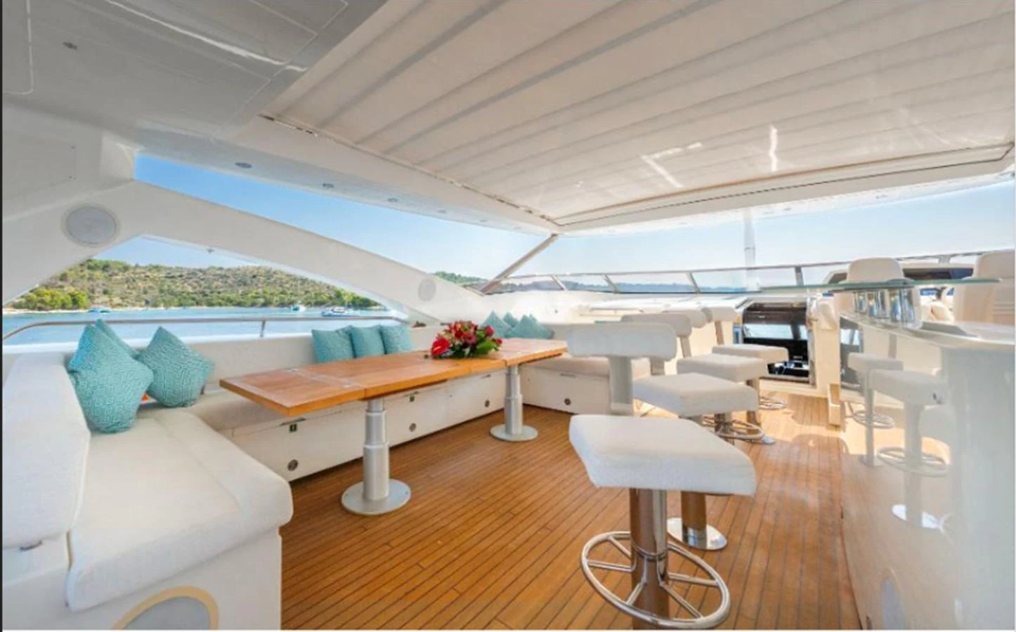 The sundeck offers a spacious and elegant area for relaxation and dining with panoramic views. aboard ARAGO Yacht for Sale