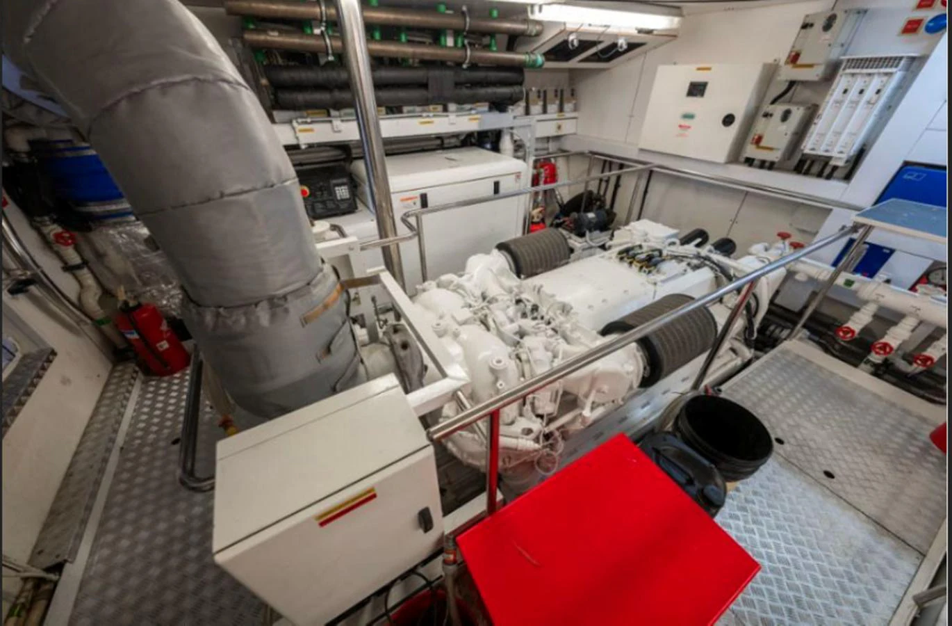 The image showcases the well-maintained engine room of the yacht, highlighting its advanced machinery and organized layout. aboard ARAGO Yacht for Sale