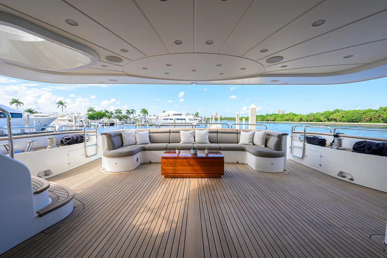 The aft deck offers a spacious and comfortable seating area with a stunning view of the marina. aboard BENETTI CLASSIC Yacht for Sale