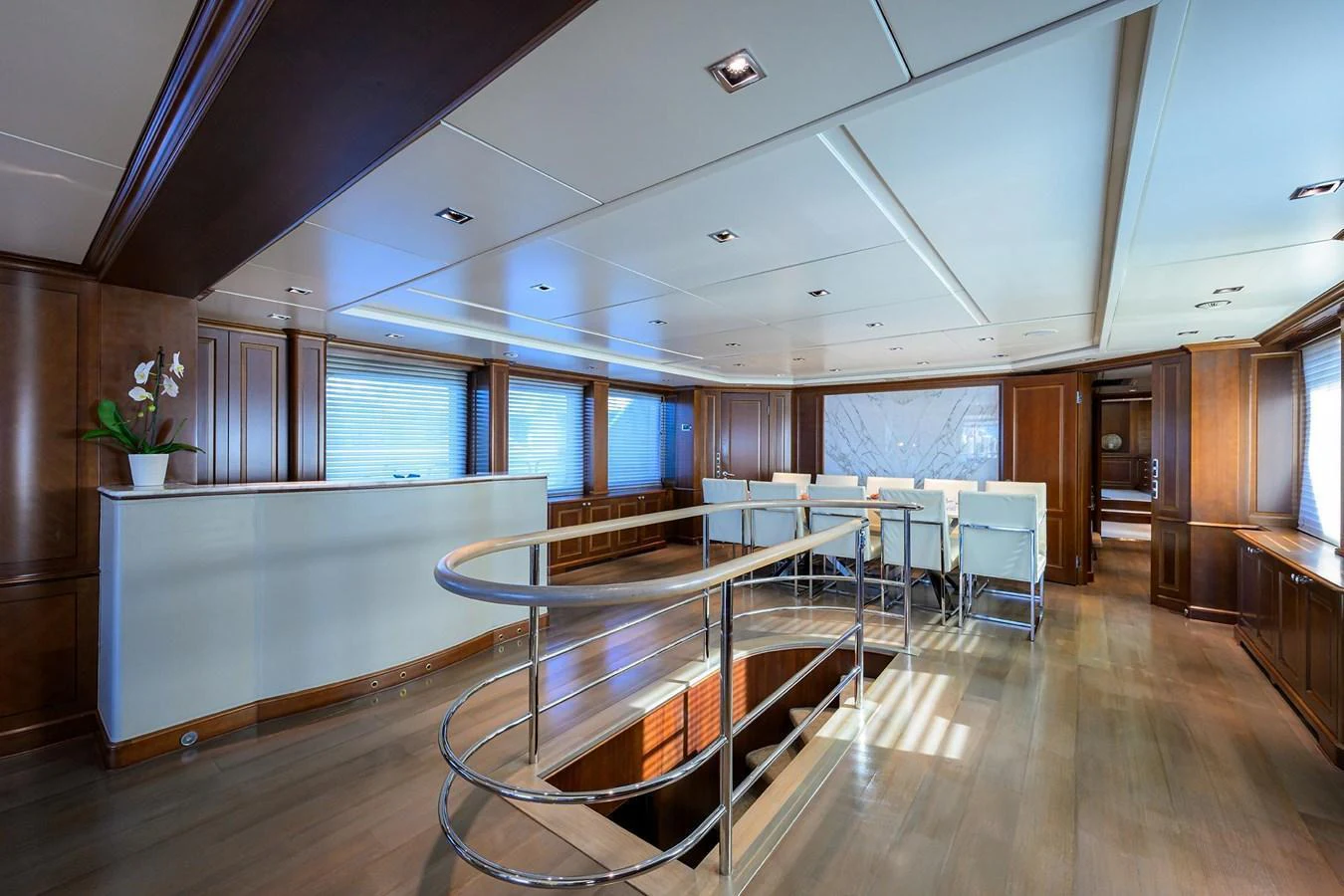 The yacht's interior features a spacious and elegant area with modern furnishings and ample natural light. aboard BENETTI CLASSIC Yacht for Sale