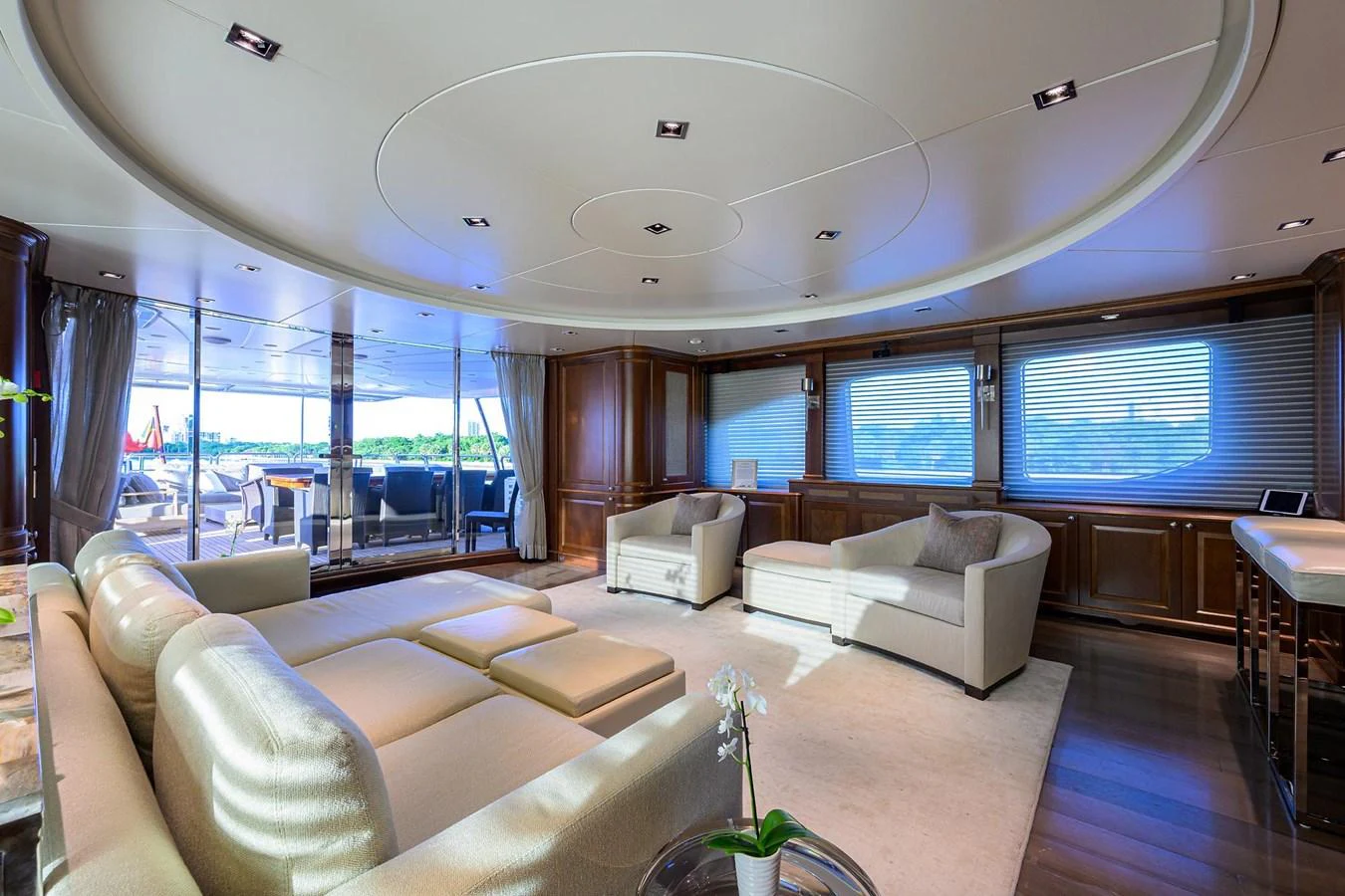 The yacht's salon features luxurious seating and ample natural light, creating an inviting and elegant atmosphere. aboard BENETTI CLASSIC Yacht for Sale