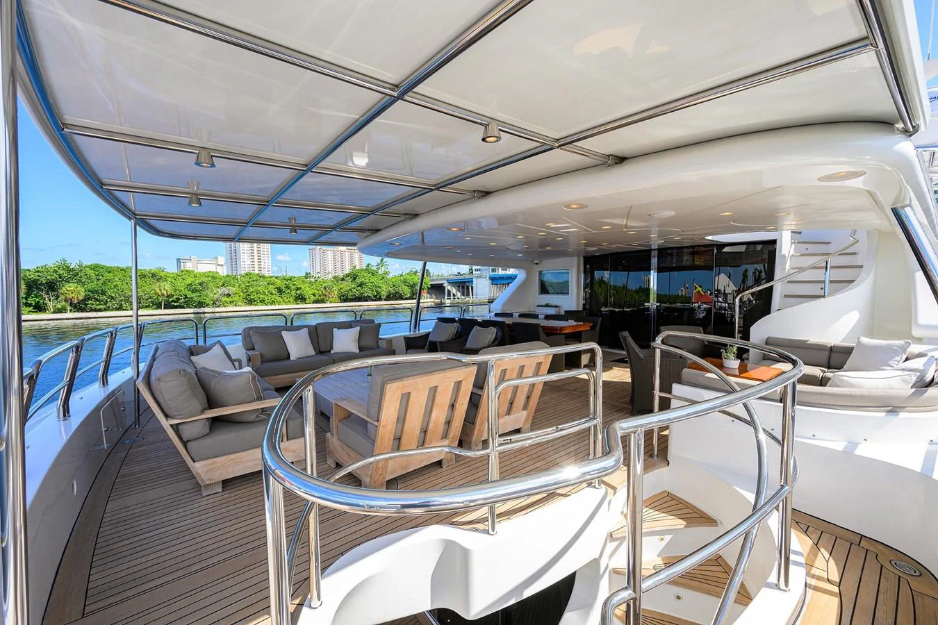 The spacious aft deck offers ample seating and a shaded area for relaxation and socializing. aboard BENETTI CLASSIC Yacht for Sale