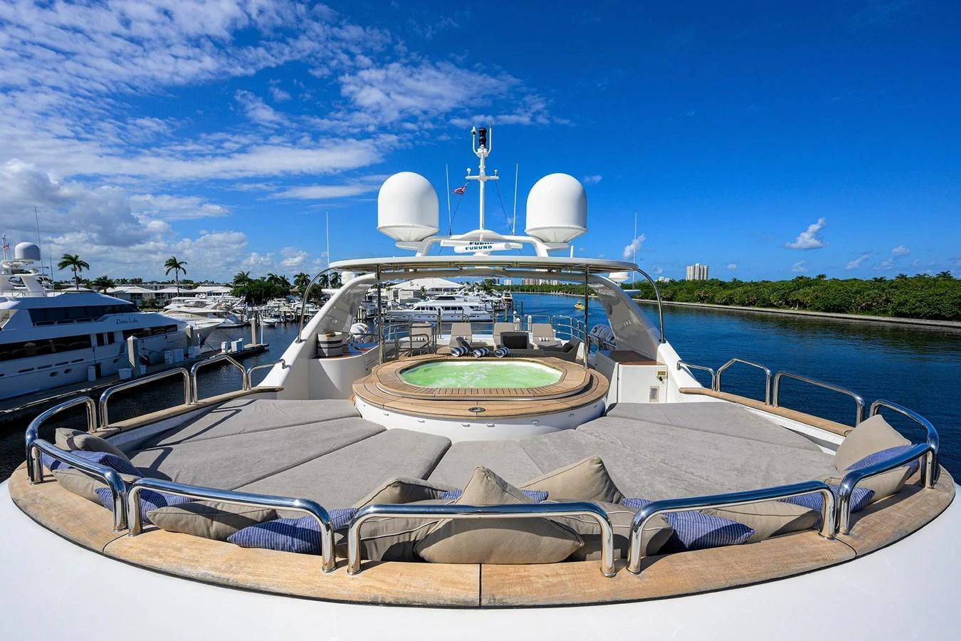 The sundeck offers a luxurious space with a jacuzzi and ample sunbathing areas, perfect for relaxation. aboard BENETTI CLASSIC Yacht for Sale