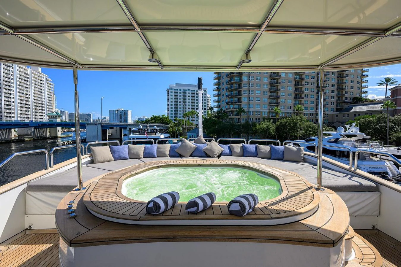 The sundeck features a luxurious jacuzzi surrounded by comfortable seating and scenic views. aboard BENETTI CLASSIC Yacht for Sale