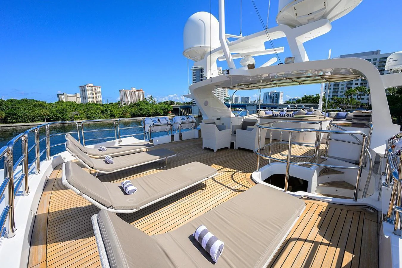 The sundeck offers luxurious lounging with ample sunbeds and a scenic view. aboard BENETTI CLASSIC Yacht for Sale