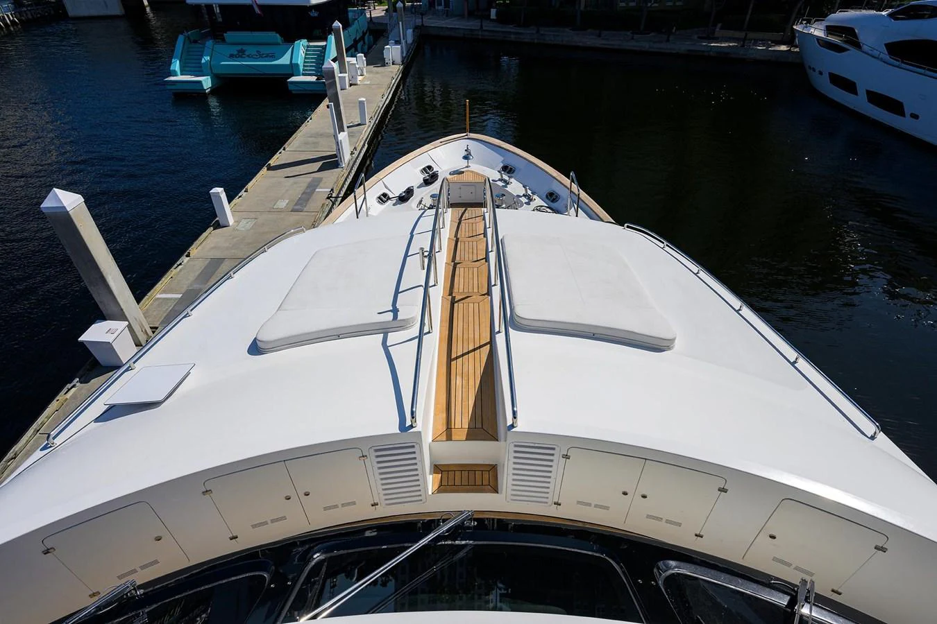 The foredeck of the yacht features spacious sun pads and a sleek design, perfect for relaxation. aboard BENETTI CLASSIC Yacht for Sale