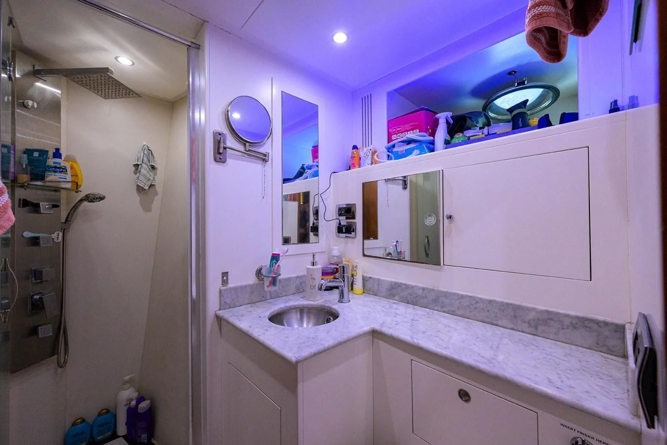 The yacht's bathroom features a sleek design with a marble countertop and modern fixtures. aboard BENETTI CLASSIC Yacht for Sale