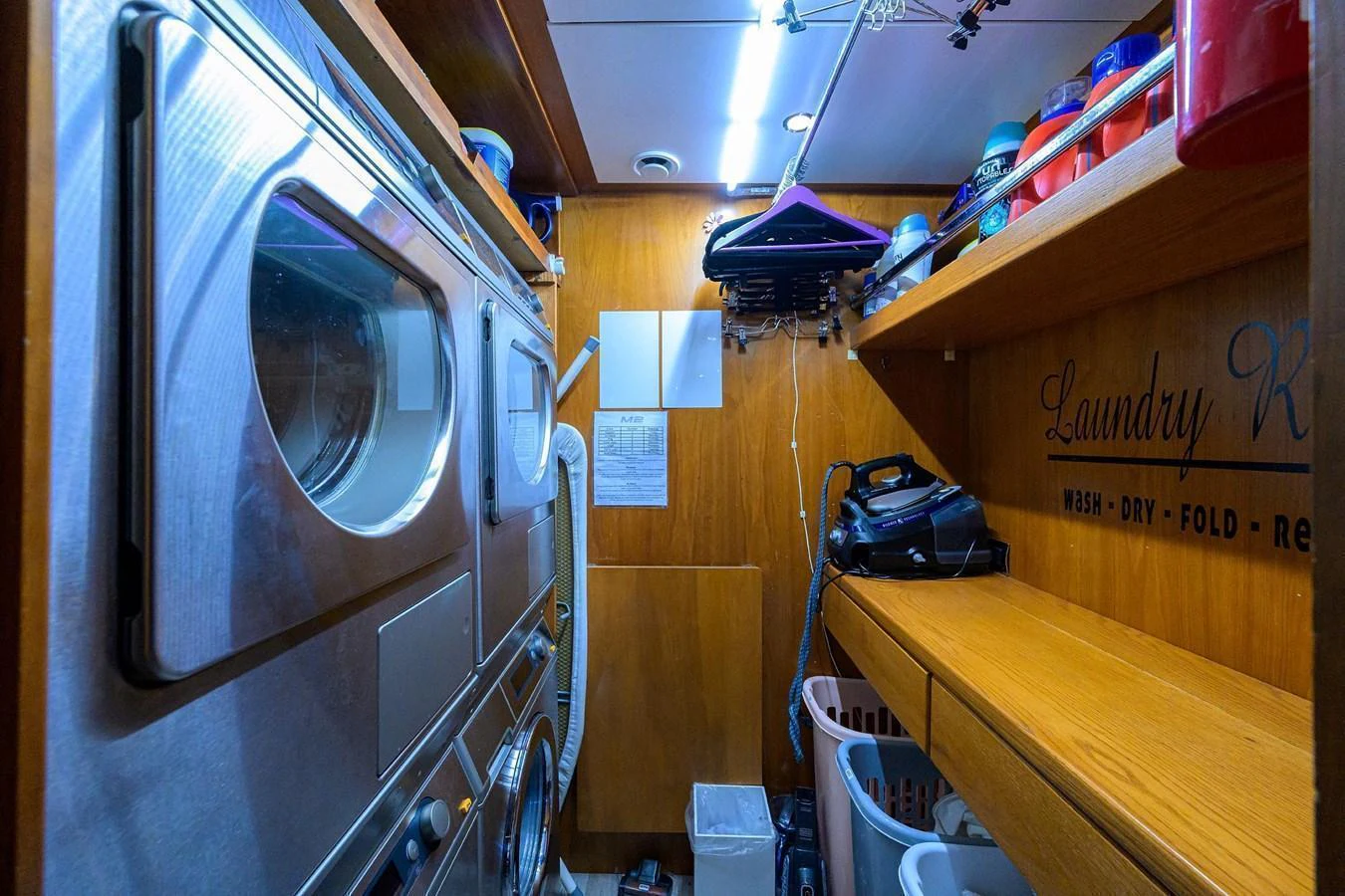 The yacht's laundry room is equipped with modern appliances and ample storage space. aboard BENETTI CLASSIC Yacht for Sale