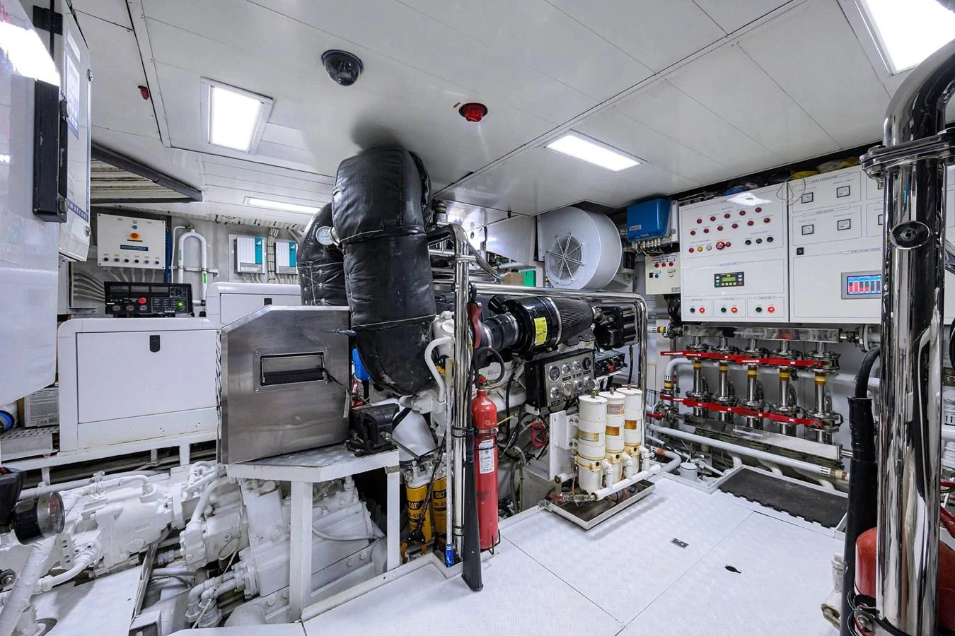 The engine room is equipped with advanced machinery and control panels, ensuring optimal performance and safety. aboard BENETTI CLASSIC Yacht for Sale