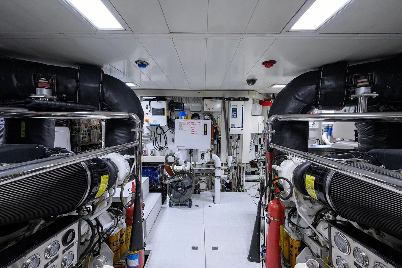 The image showcases the well-maintained engine room of the yacht, highlighting its technical sophistication. aboard BENETTI CLASSIC Yacht for Sale