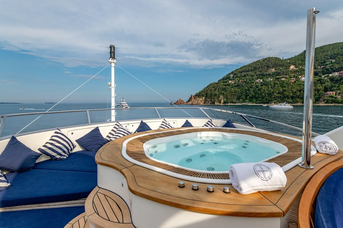 The sundeck features a luxurious jacuzzi with plush seating and stunning sea views. aboard SEA BLUEZ Yacht for Sale