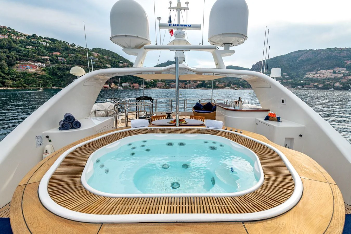The sundeck features a luxurious jacuzzi with stunning views of the surrounding landscape. aboard SEA BLUEZ Yacht for Sale