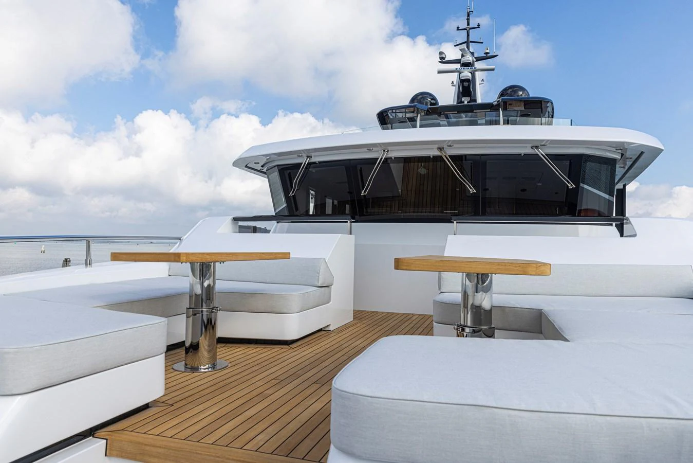 The foredeck features luxurious seating and tables, perfect for relaxation and socializing. aboard DUCALE 120 Yacht for Sale