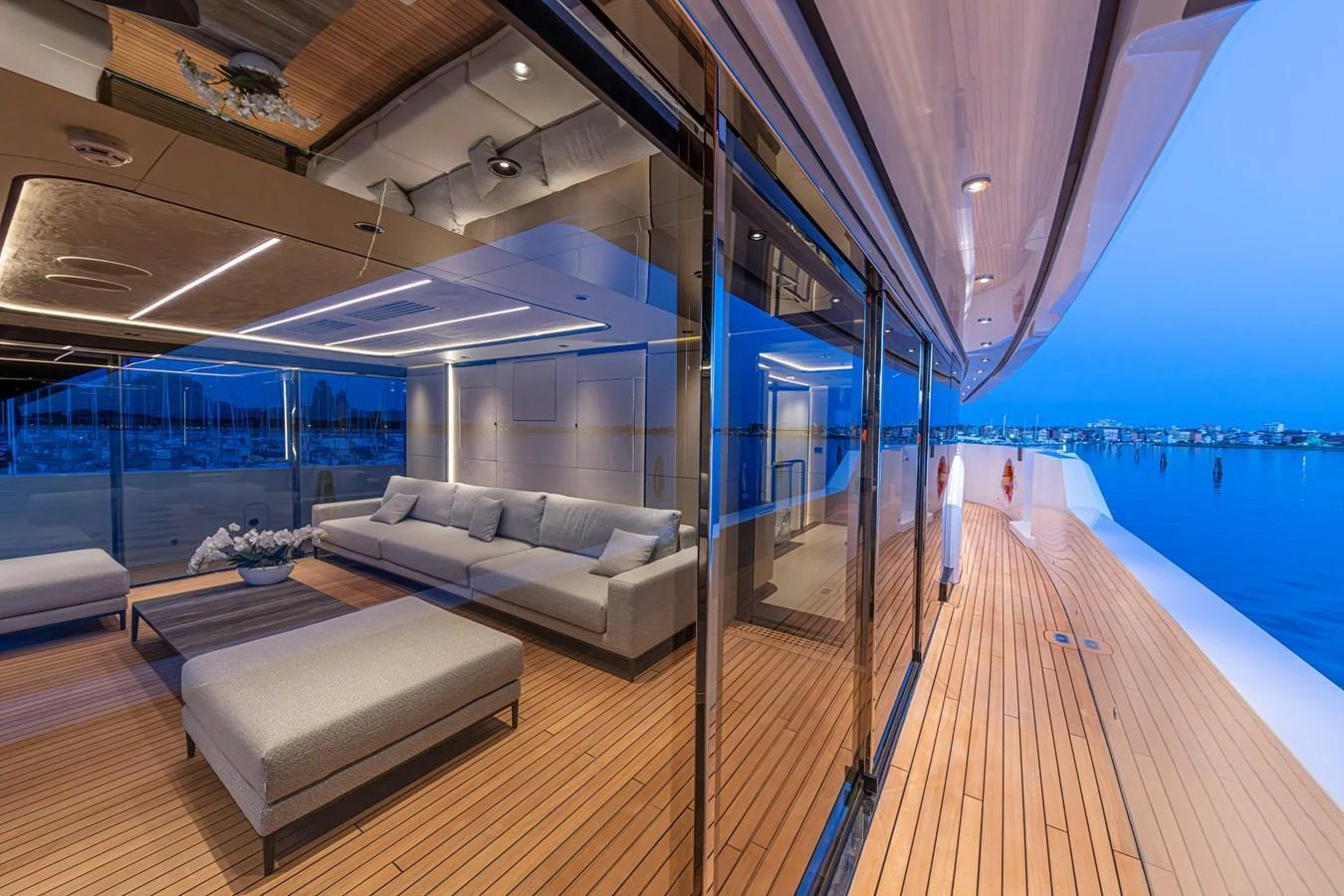 The aft deck offers a spacious and elegant outdoor seating area with stunning views. aboard DUCALE 120 Yacht for Sale
