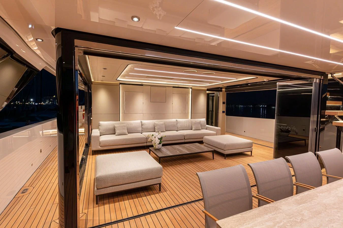 The yacht's salon features a spacious and elegantly designed seating area with modern furnishings and ambient lighting. aboard DUCALE 120 Yacht for Sale