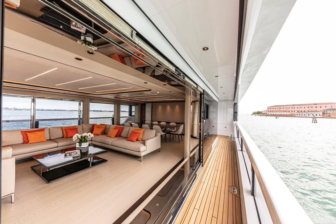 The spacious salon opens up to a beautiful deck area with stunning views of the water. aboard DUCALE 120 Yacht for Sale
