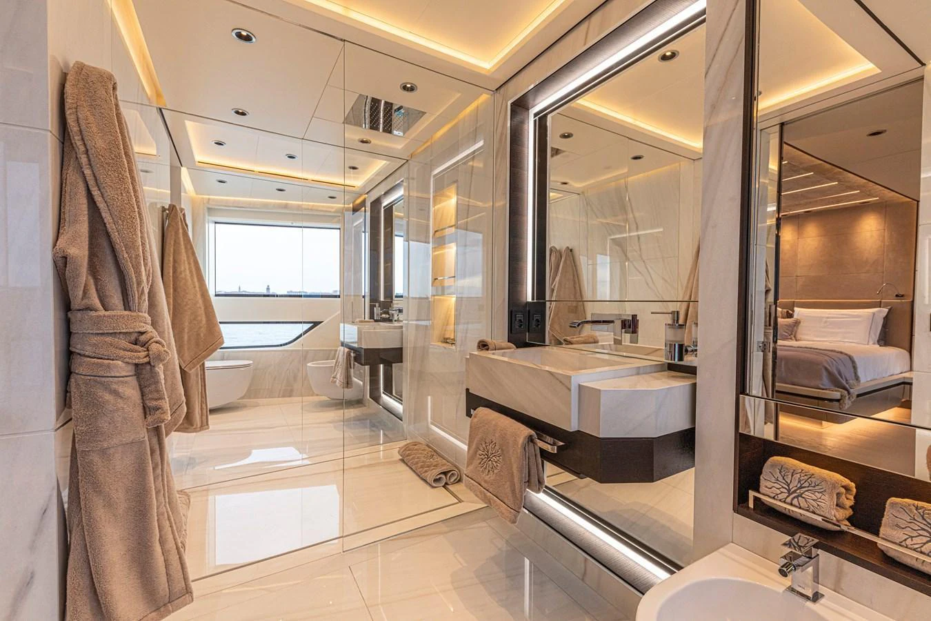 The luxurious bathroom features modern fixtures, a spacious layout, and elegant lighting. aboard DUCALE 120 Yacht for Sale