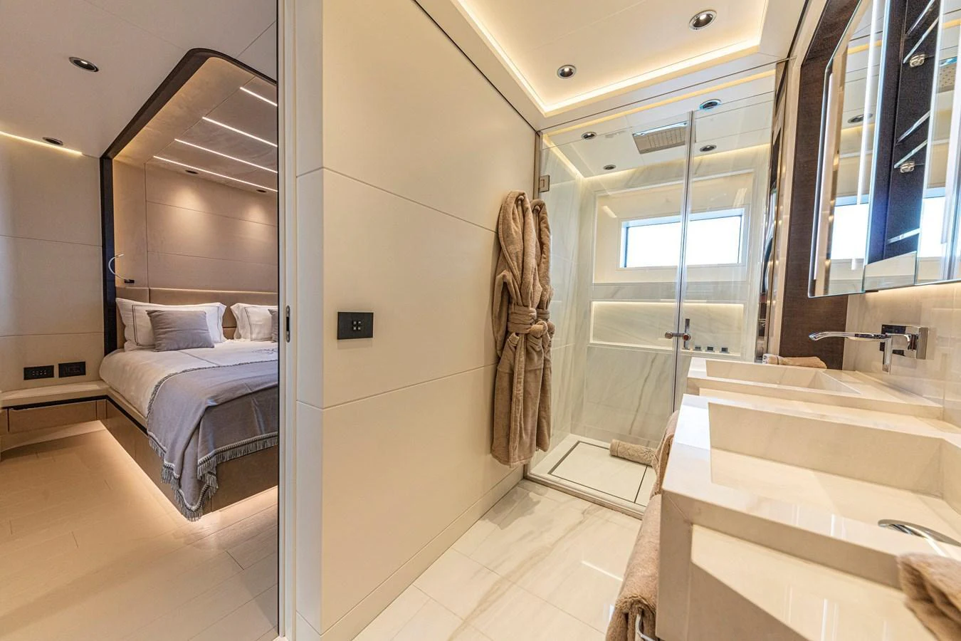 The master stateroom features a luxurious en-suite bathroom with modern fixtures and elegant design. aboard DUCALE 120 Yacht for Sale