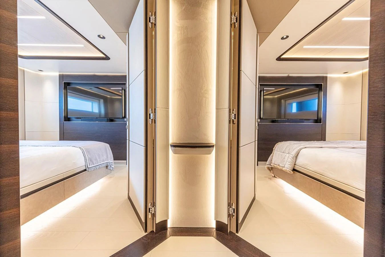 The image showcases the luxurious staterooms of the yacht, featuring modern design and ambient lighting. aboard DUCALE 120 Yacht for Sale