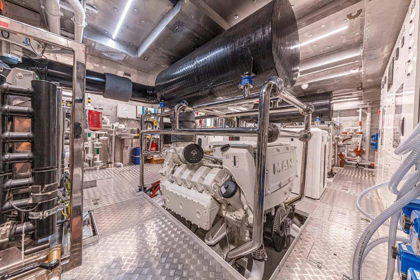The engine room showcases advanced machinery and a well-organized layout. aboard DUCALE 120 Yacht for Sale