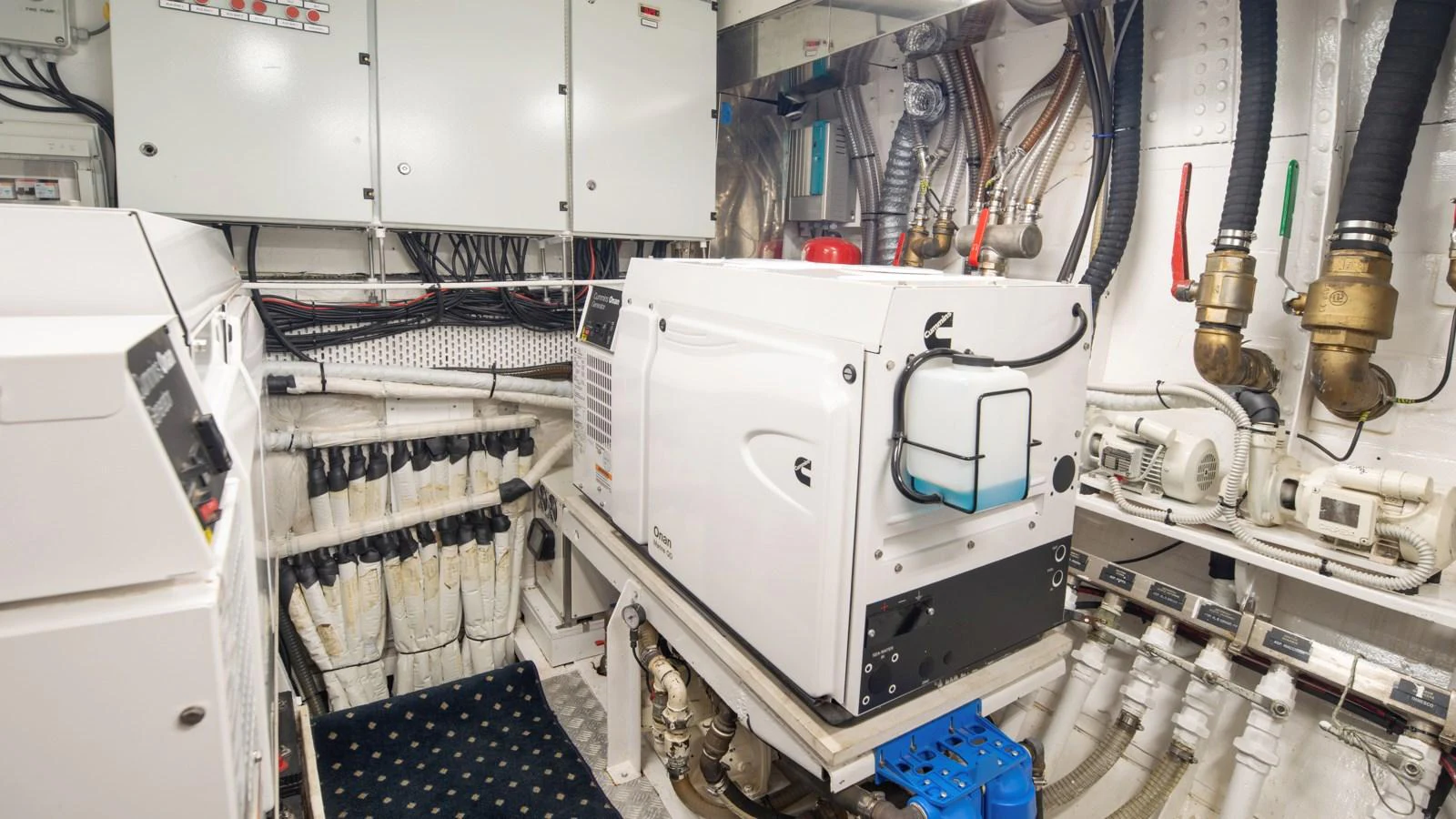 The image showcases the well-organized engine room of the yacht, featuring advanced machinery and equipment. aboard CANDIDA Yacht for Sale