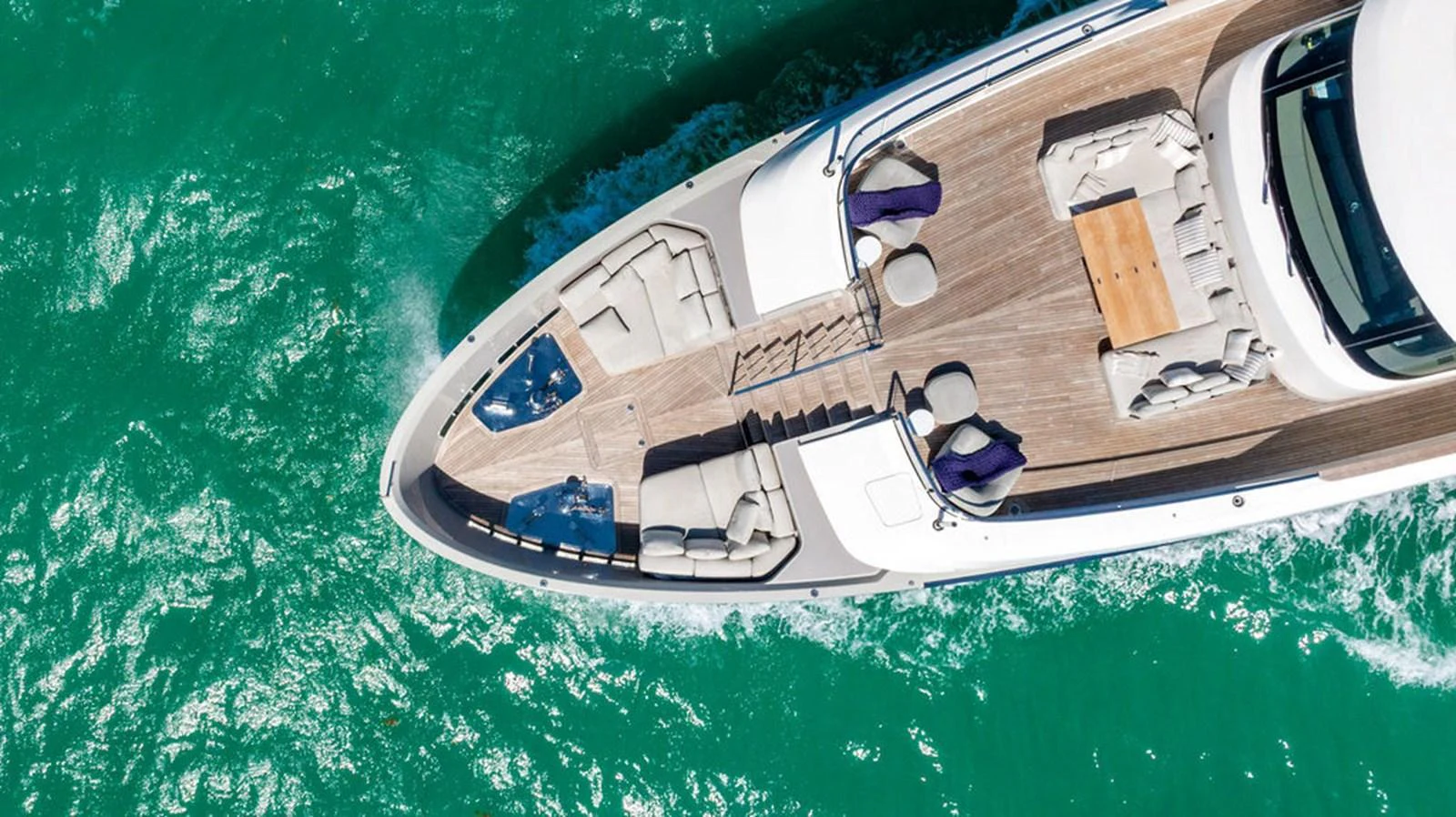 The yacht's foredeck features luxurious seating and lounging areas with stunning views over the water. aboard SANLORENZO SD118/129 Yacht for Sale