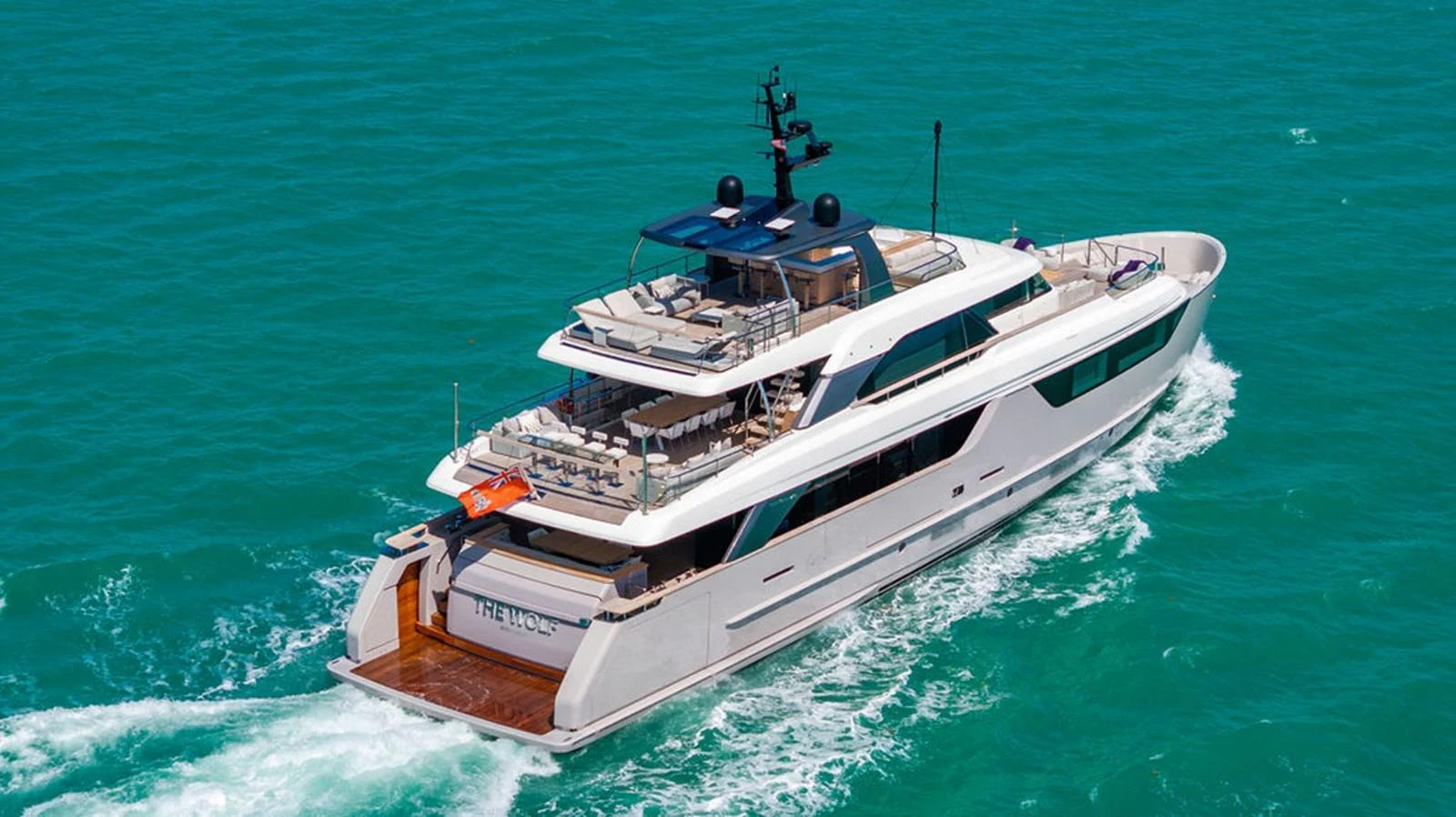 A sleek and modern yacht cruising through clear blue waters. aboard SANLORENZO SD118/129 Yacht for Sale