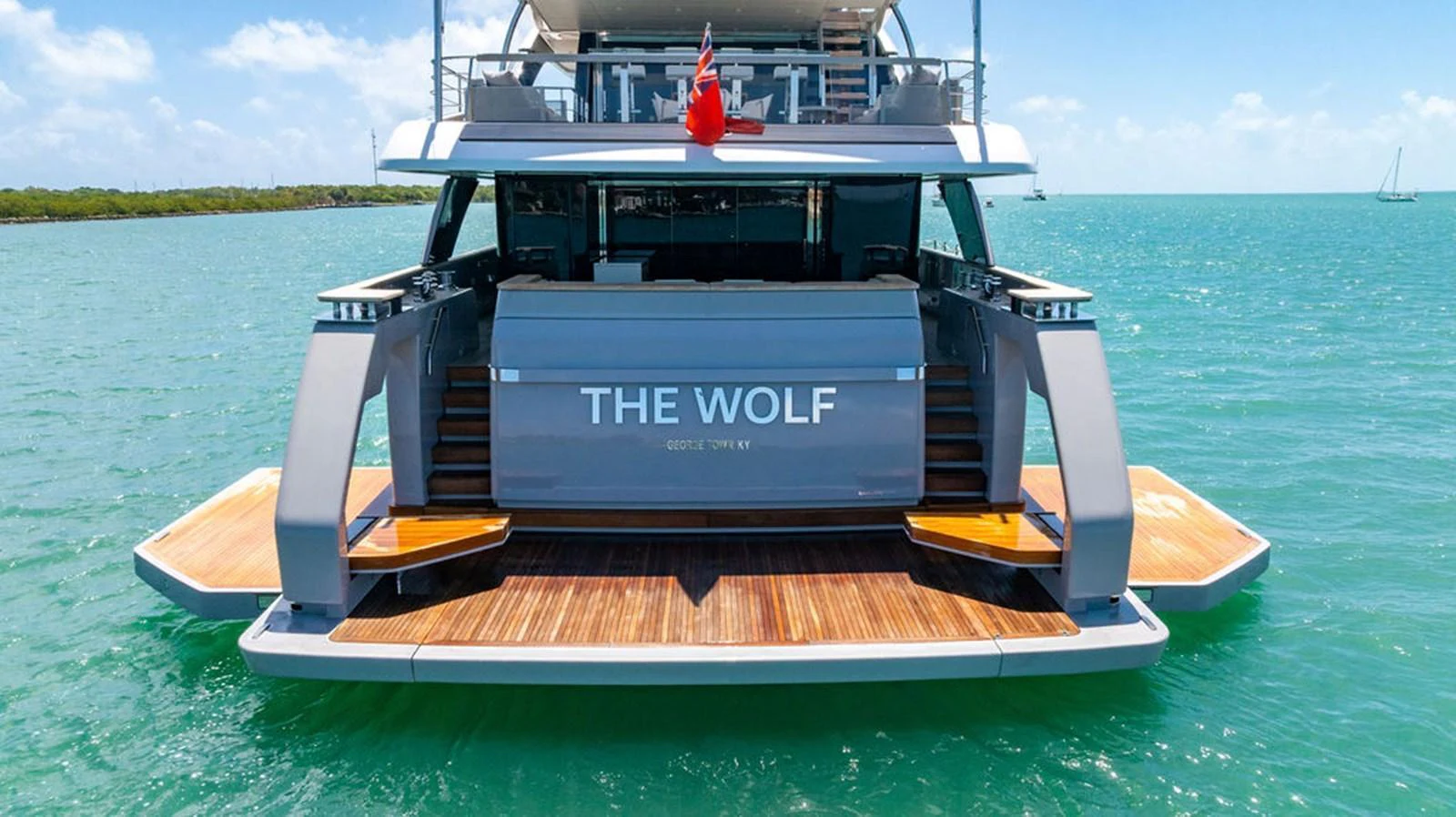 The yacht's aft deck features a spacious swim platform and elegant design, perfect for enjoying the water. aboard SANLORENZO SD118/129 Yacht for Sale