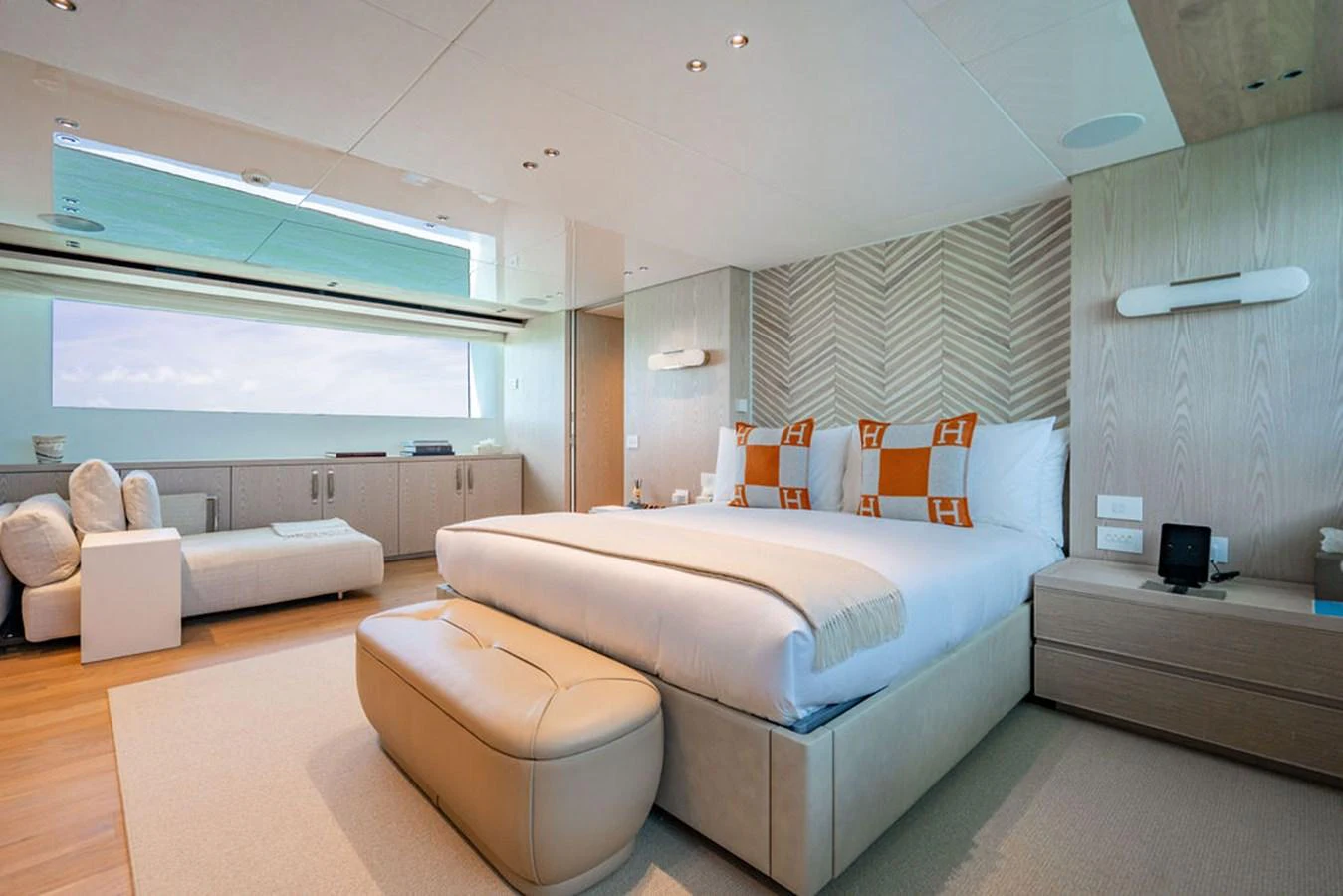 The master stateroom features a luxurious bed with elegant decor and ample natural light. aboard SANLORENZO SD118/129 Yacht for Sale