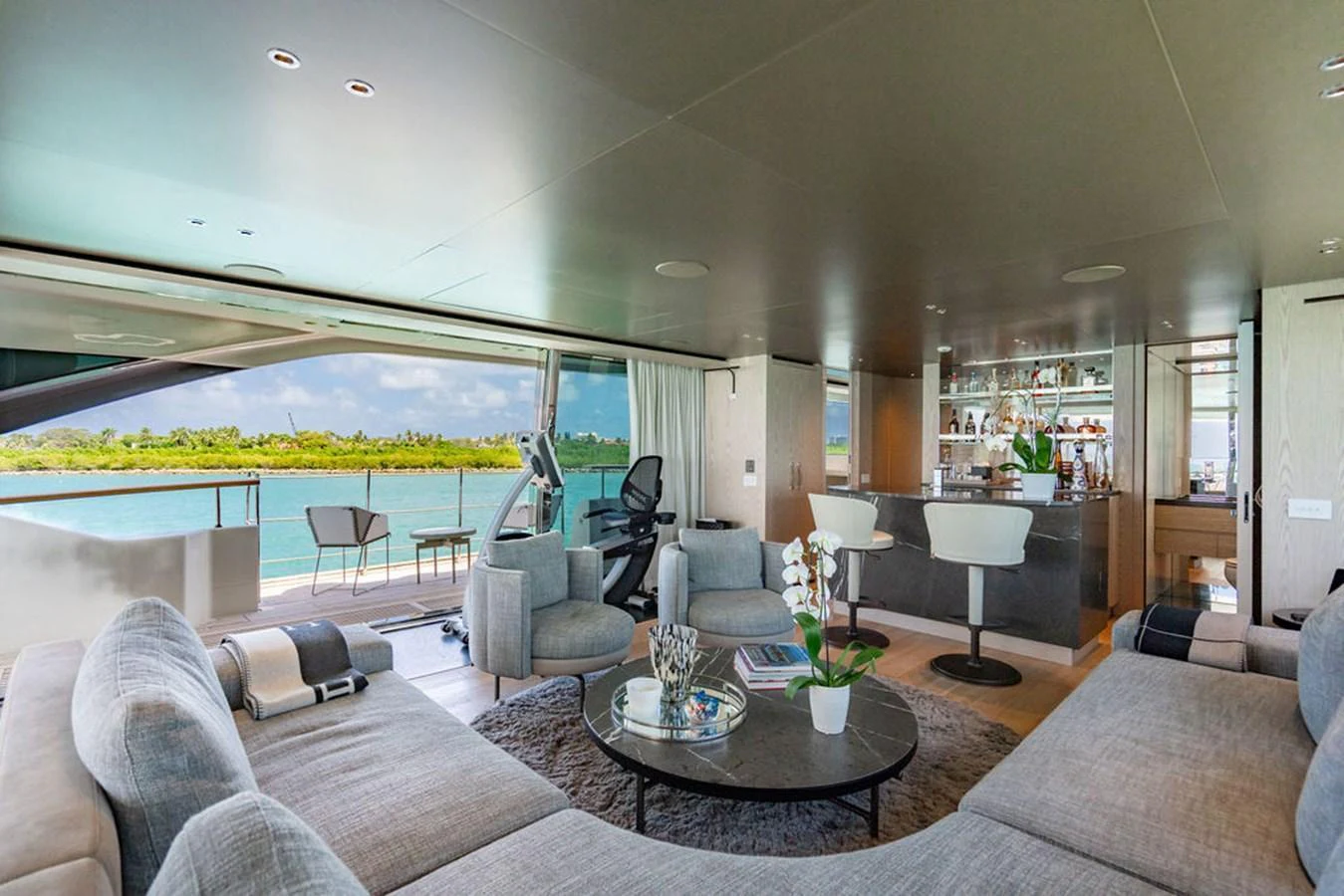 The salon offers a spacious and luxurious living area with panoramic views and modern furnishings. aboard SANLORENZO SD118/129 Yacht for Sale