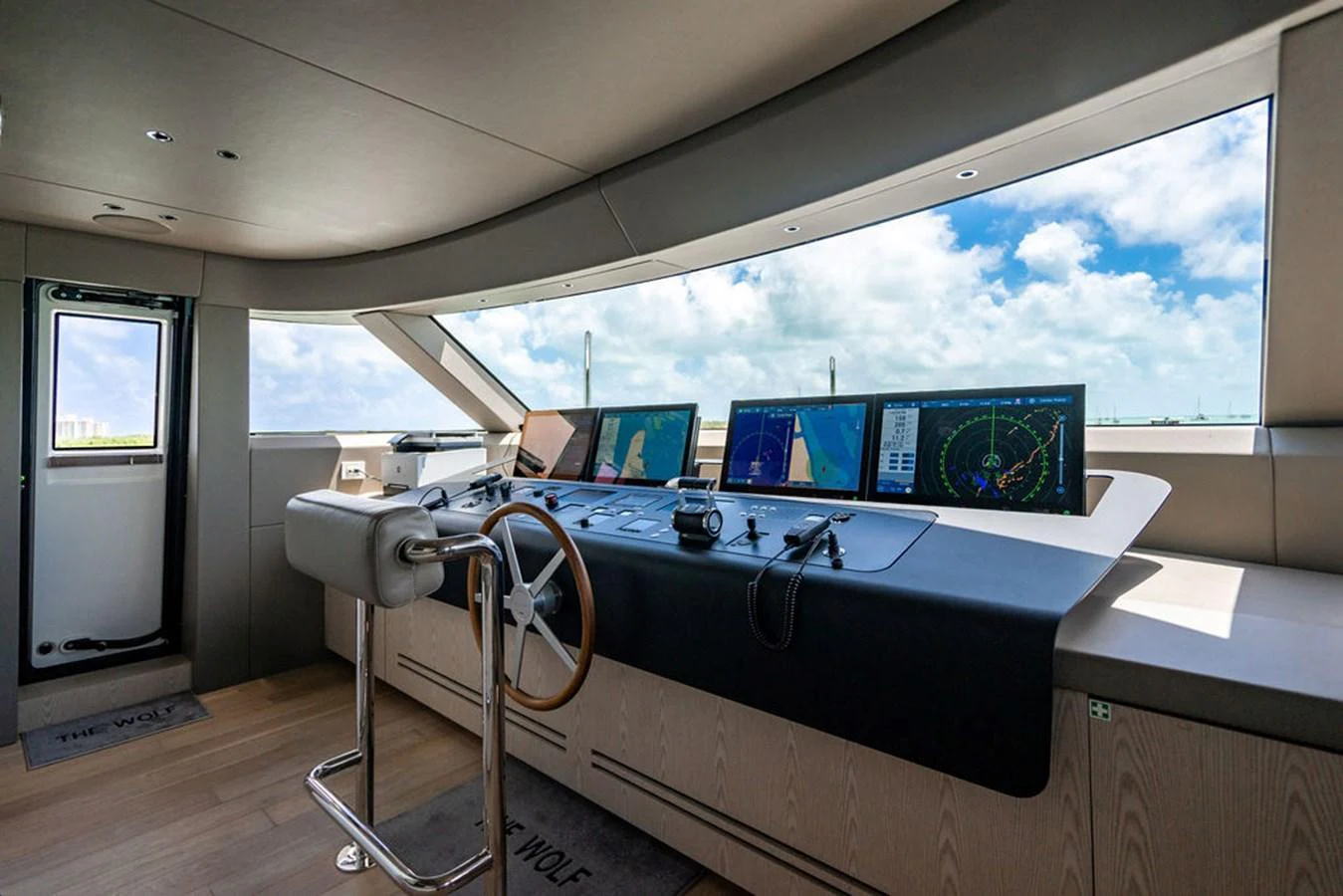 The helm station features advanced navigation systems and a panoramic view. aboard SANLORENZO SD118/129 Yacht for Sale