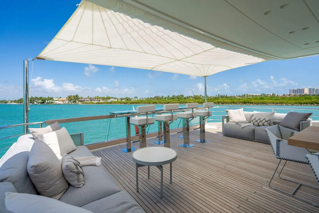 The aft deck offers a luxurious outdoor lounging and dining area with stunning views of the water. aboard SANLORENZO SD118/129 Yacht for Sale