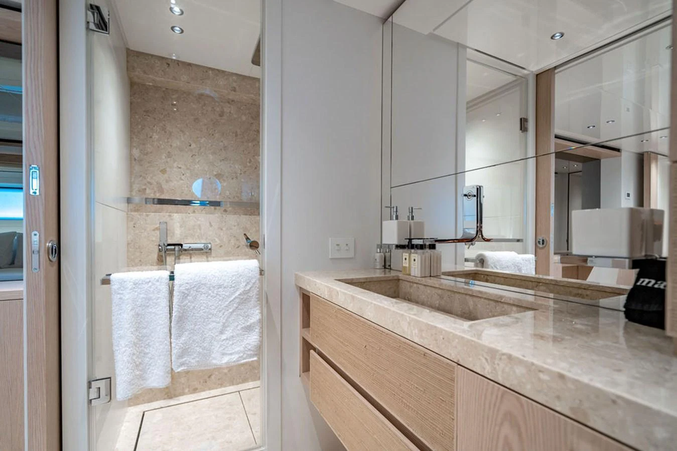 The yacht's bathroom features a sleek design with modern fixtures and a spacious shower area. aboard SANLORENZO SD118/129 Yacht for Sale