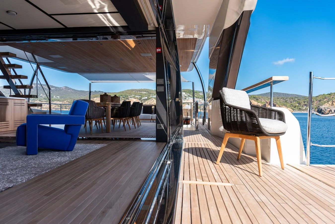 The aft deck offers a seamless transition between indoor and outdoor living spaces with stylish seating and stunning views. aboard AV1 Yacht for Sale