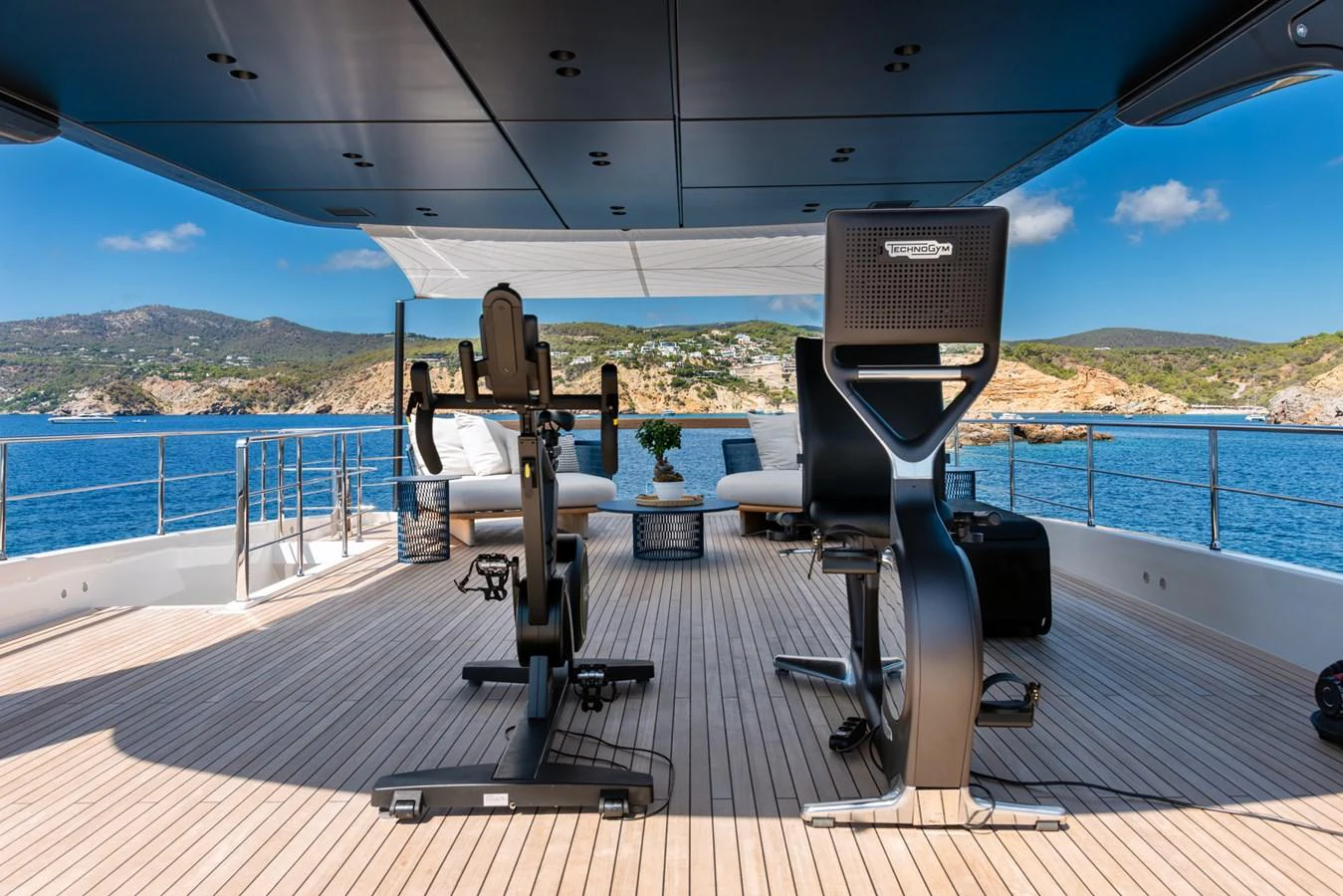 The sundeck features a well-equipped fitness area with stunning sea views. aboard AV1 Yacht for Sale