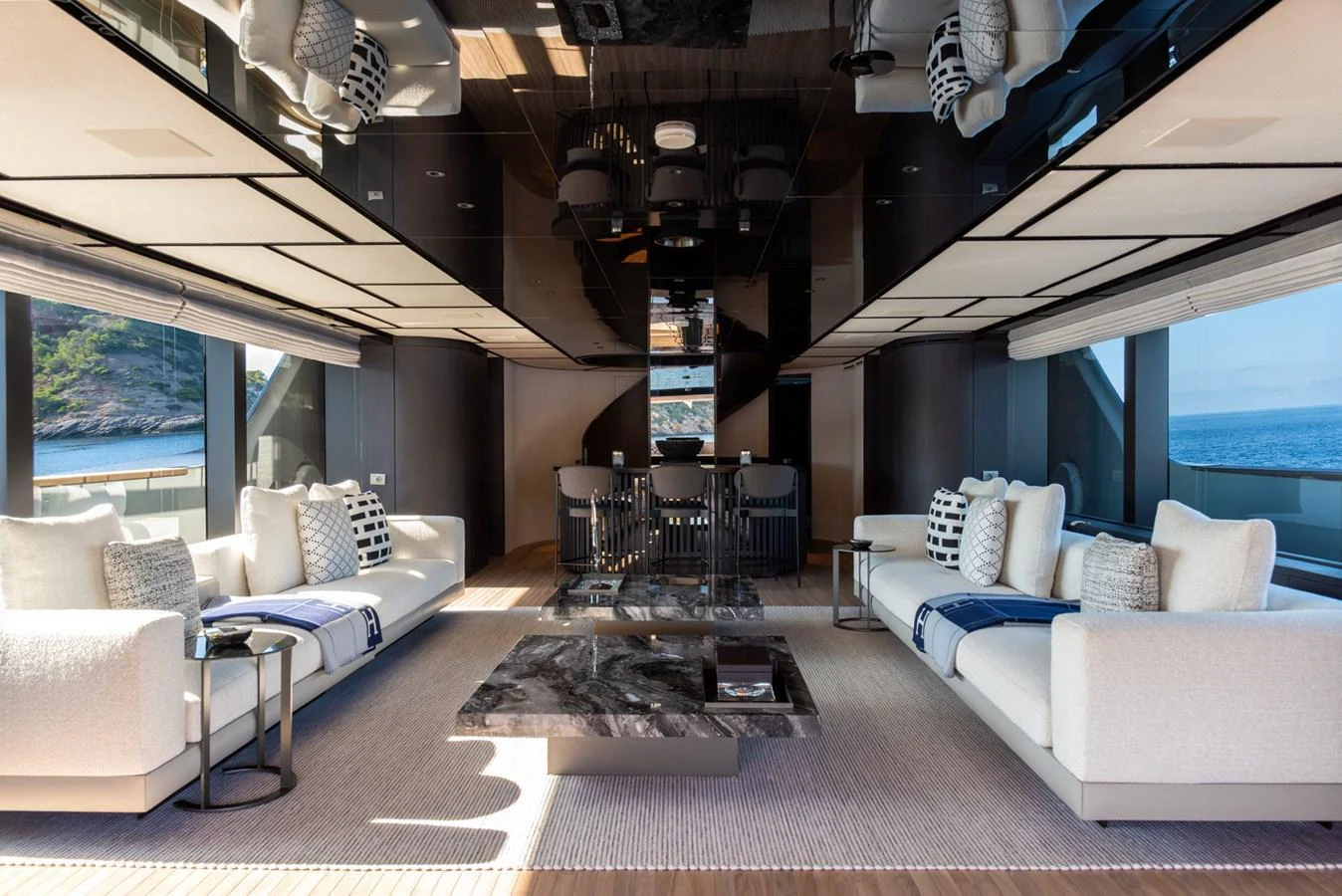 The salon offers a luxurious and spacious seating area with panoramic views of the sea. aboard AV1 Yacht for Sale